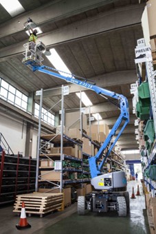 Genie cherry picker in use